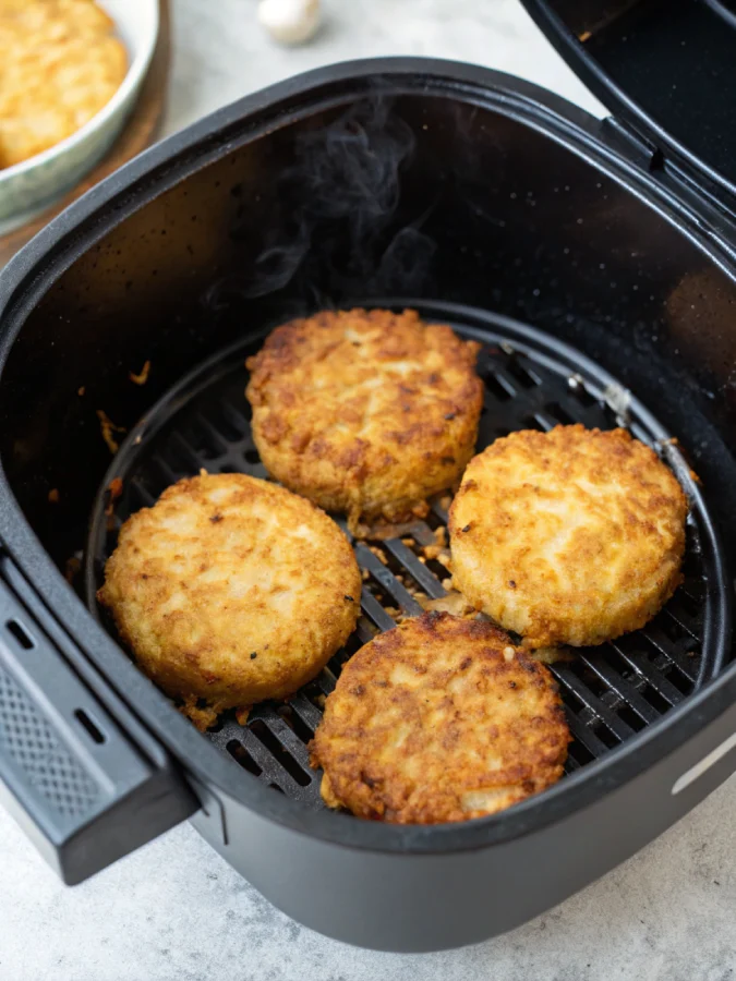 Crispy frozen hash brown patties just cooked in air fryer