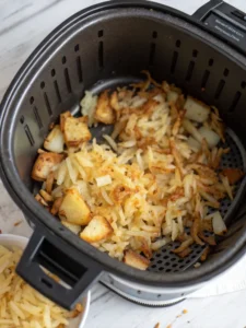 Cooking hash browns in air fryer mid-process
