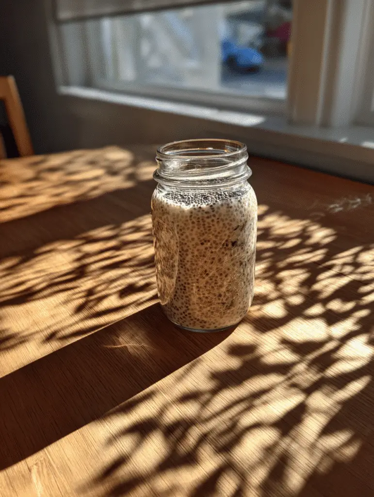Chia Seeds Benefits Benefits of chia seeds in smoothies shown in a jar with soaked chia mixture