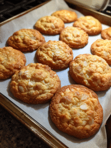 Cake mix cookies stacked on tray with soft texture and golden edges