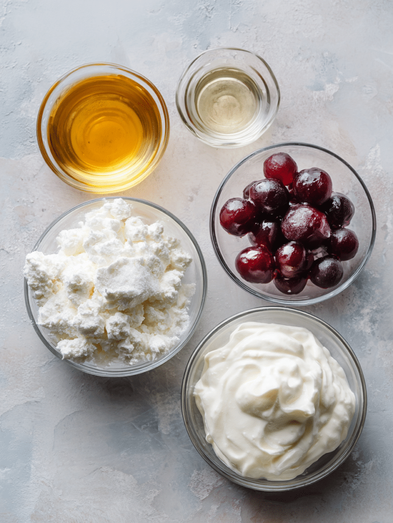 Ingredients for jello weight loss recipe including gelatin powder, juice, and Greek yogurt on a kitchen counter.