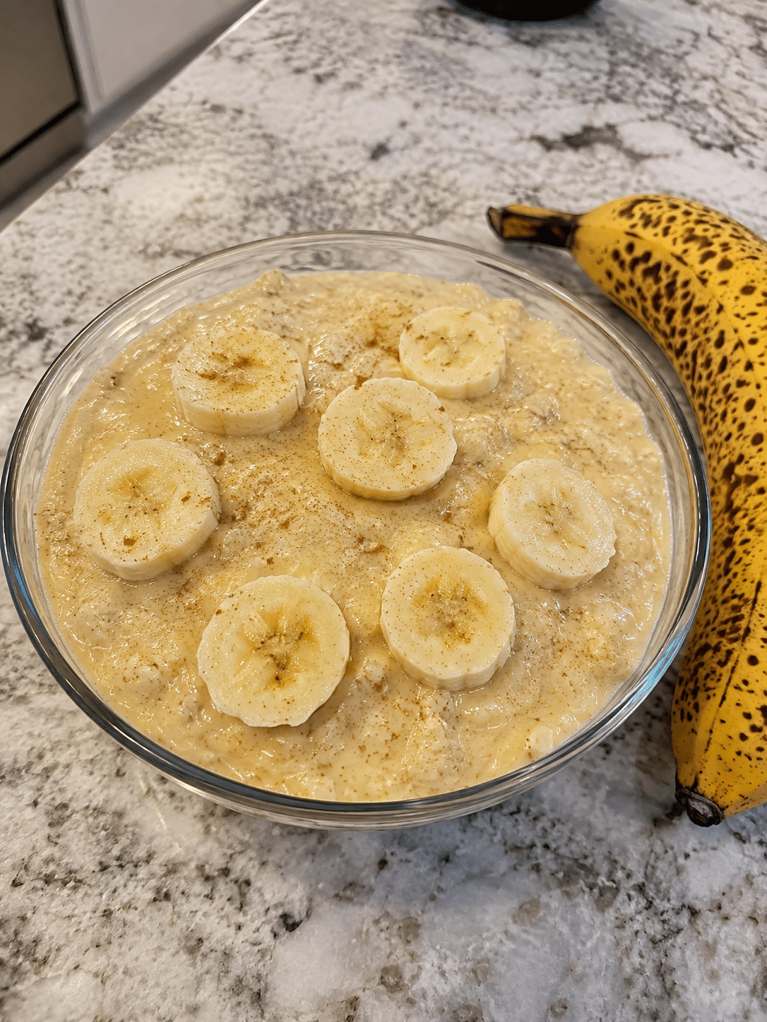 African banana trick recipe with ripe banana, oats, yogurt, and cinnamon